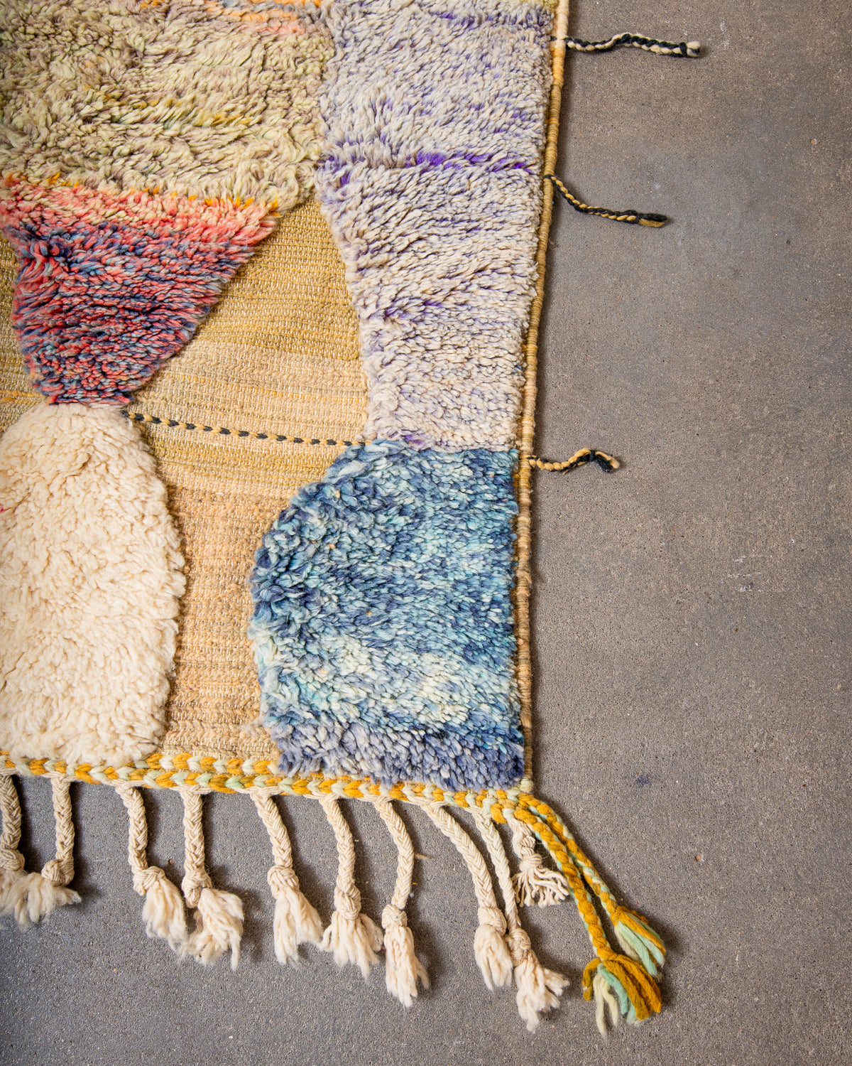 Modern, designer, handcrafted Berber rug from Morocco. Beniourain carpet with beautiful colours and patterns and fluffy wool texture.
